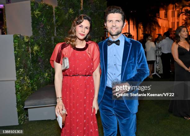 Naomi Sablan and Adam Scott attend the 2022 Vanity Fair Oscar Party hosted by Radhika Jones at Wallis Annenberg Center for the Performing Arts on...