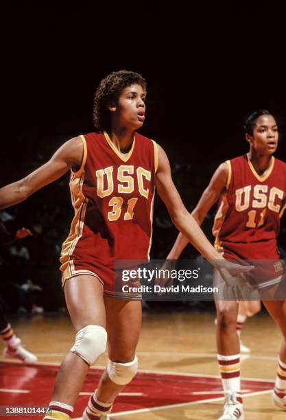 Cheryl Miller of the USC Trojans plays in an NCAA women's basketball game against Stanford University on February 4, 1983 in Maples Pavilion at...