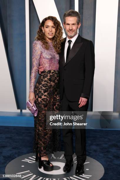 Cleo Wade and Simon Kinberg attend the 2022 Vanity Fair Oscar Party Hosted By Radhika Jones at Wallis Annenberg Center for the Performing Arts on...