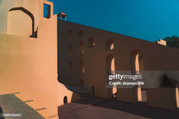 largest ancient stone sundial jantar mantar in jaipur rajasthan india - maharaja palace stock pictures, royalty-free photos & images