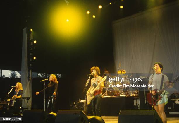 Charlotte Caffey, Belinda Carlisle, Gina Schock, Kathy Valentine, and Jane Wiedlin of The Go-Go's perform at Shoreline Amphitheatre on July 31, 2000...