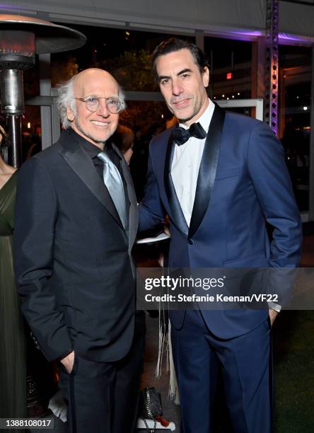 Larry David and Sacha Baron Cohen attend the 2022 Vanity Fair Oscar Party hosted by Radhika Jones at Wallis Annenberg Center for the Performing Arts...