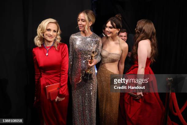 In this handout photo provided by A.M.P.A.S., Marlee Matlin, Sian Heder, winner of the the Writing award for ‘CODA,’ Emilia Jones, and Amy Forsyth...