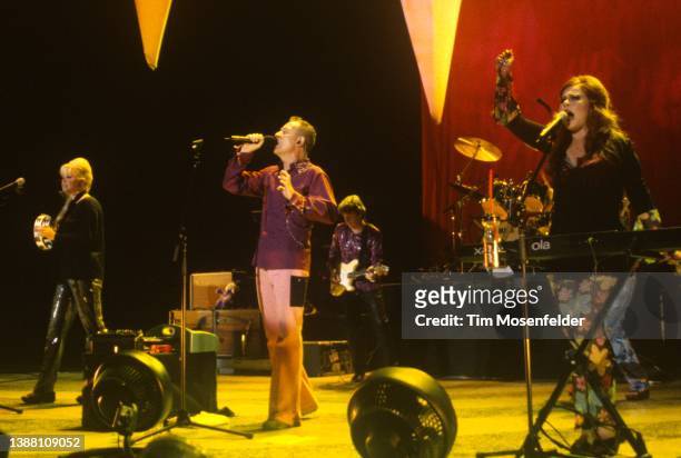 Cindy Wilson, Fred Schneider, and Kate Pierson of The B-52's performs at Shoreline Amphitheatre on July 31, 2000 in Mountain View, California.