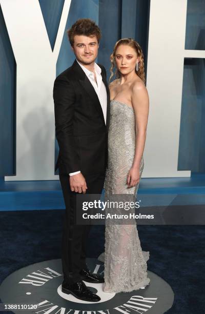 Joe Keery and Maika Monroe attend the 2022 Vanity Fair Oscar Party hosted by Radhika Jones at Wallis Annenberg Center for the Performing Arts on...