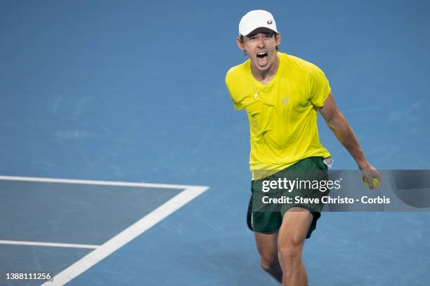 Alex De Minaur of Australia reacts to winning the match Matteo Berrettini of Italy during their 2022 ATP Cup tie on day two between Australia and...