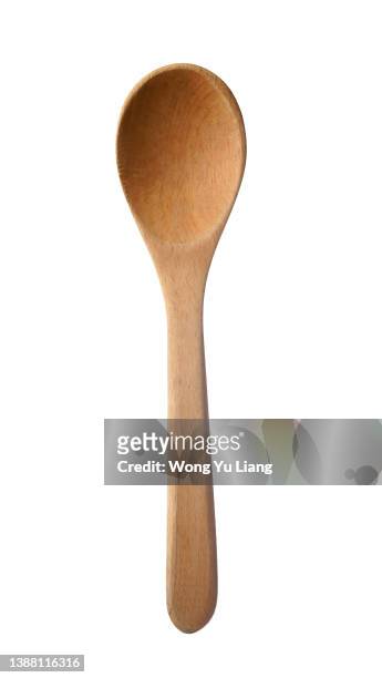 wooden spoon on white background - spatola foto e immagini stock