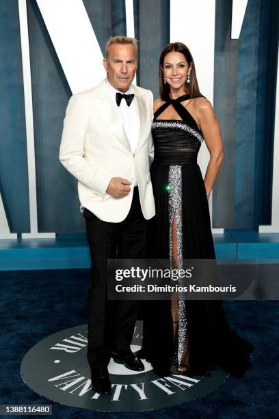 Kevin Costner and Christine Baumgartner attend the 2022 Vanity Fair Oscar Party hosted by Radhika Jones at Wallis Annenberg Center for the Performing...