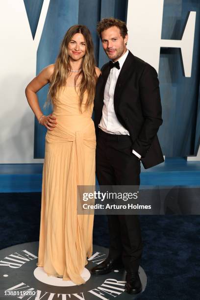 Amelia Warner and Jamie Dornan attends the 2022 Vanity Fair Oscar Party hosted by Radhika Jones at Wallis Annenberg Center for the Performing Arts on...