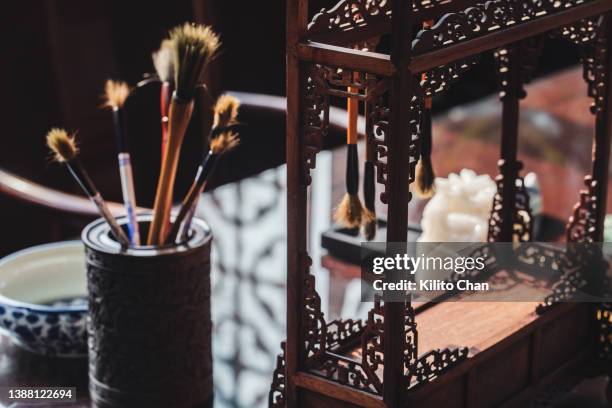 traditional chinese calligraphy writing instruments-brush pen, pen holder, pen rack, in well and paperweight - writing instrument stock pictures, royalty-free photos & images