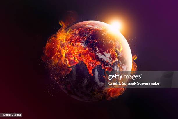 concept illustration global warming around the world is about to be burned by human hands (3d image) - cambiamenti climatici foto e immagini stock