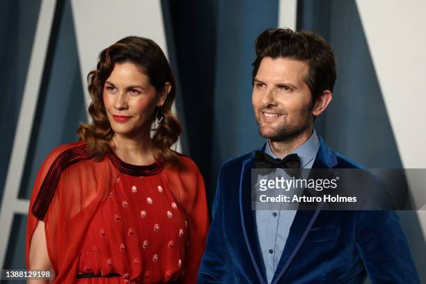 Naomi Sablan and Adam Scott attend the 2022 Vanity Fair Oscar Party hosted by Radhika Jones at Wallis Annenberg Center for the Performing Arts on...