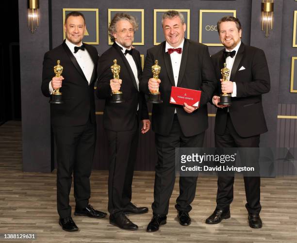 Tristan Myles, Brian Connor, Paul Lambert, Gerd Nefzer, winners of the Visual Effects award for ‘Dune’ pose in the press room at the 94th Annual...