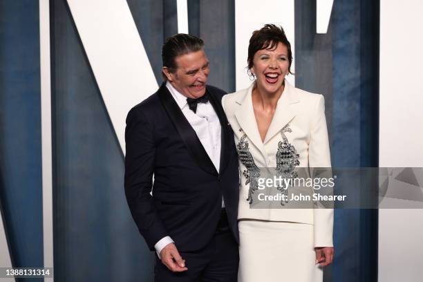 Ciarán Hinds and Maggie Gyllenhaal attend the 2022 Vanity Fair Oscar Party hosted by Radhika Jones at Wallis Annenberg Center for the Performing Arts...