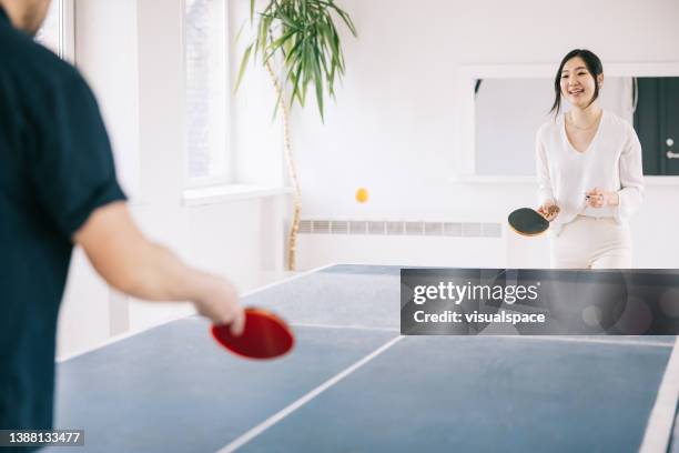 japanese business colleagues playing table tennis - men's table tennis stock pictures, royalty-free photos & images