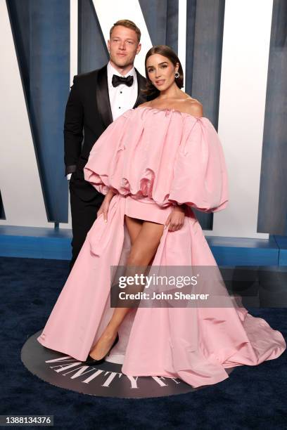 Christian McCaffrey and Olivia Culpo attend the 2022 Vanity Fair Oscar Party hosted by Radhika Jones at Wallis Annenberg Center for the Performing...