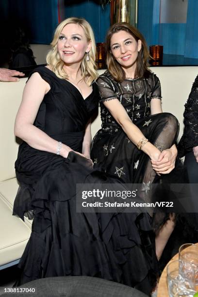 Kirsten Dunst and Sofia Coppola attend the 2022 Vanity Fair Oscar Party hosted by Radhika Jones at Wallis Annenberg Center for the Performing Arts on...
