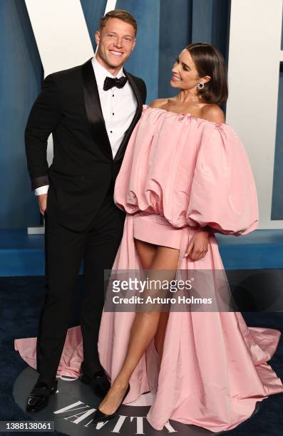 Christian McCaffrey and Olivia Culpo attend the 2022 Vanity Fair Oscar Party hosted by Radhika Jones at Wallis Annenberg Center for the Performing...