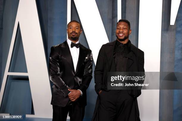Michael B. Jordan and Jonathan Majors attend the 2022 Vanity Fair Oscar Party Hosted By Radhika Jones at Wallis Annenberg Center for the Performing...