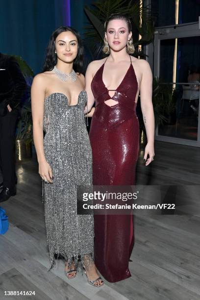 Camila Mendes and Lili Reinhart attend the 2022 Vanity Fair Oscar Party hosted by Radhika Jones at Wallis Annenberg Center for the Performing Arts on...