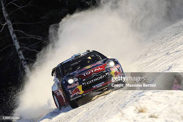 Mikko Hirvonen of Finland and Jarmo Lehtinen of Finland compete in their Citroen Total WRT Citroen DS3 WRC during Day 3 of the WRC Rally Sweden on...