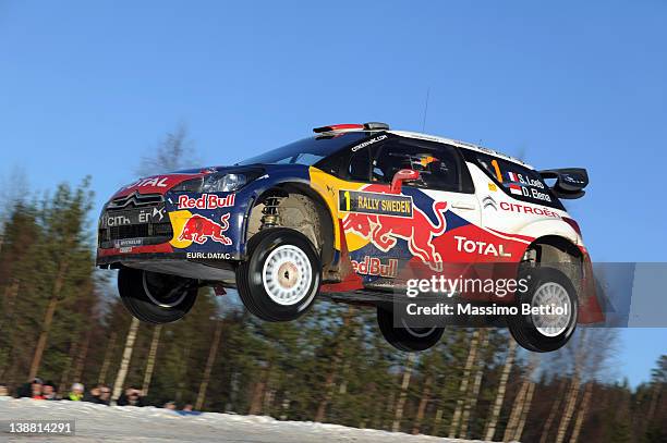 Sebastien Loeb of France and Daniel Elena of Monaco compete in their Citroen Total WRT Citroen DS3 WRC during Day 3 of the WRC Rally Sweden on...