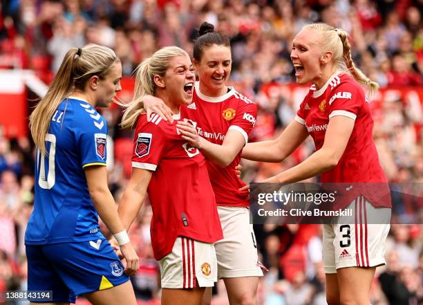 Alessia Russo of Manchester United celebrates with Jade Moore and Maria Thorisdottir after scoring their team's third goal during the Barclays FA...