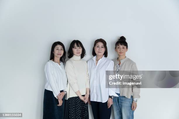 portrait of women - four people white background stock pictures, royalty-free photos & images