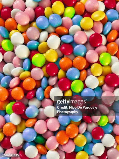 full frame shot of multi colored candies. - candy chocolate gum stock pictures, royalty-free photos & images