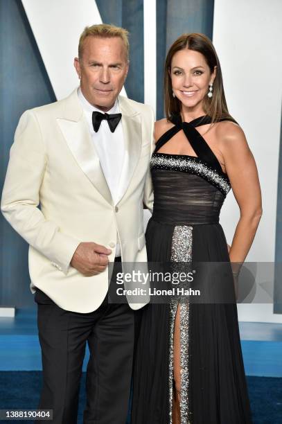 Kevin Costner and Christine Baumgartner attend the 2022 Vanity Fair Oscar Party hosted by Radhika Jones at Wallis Annenberg Center for the Performing...