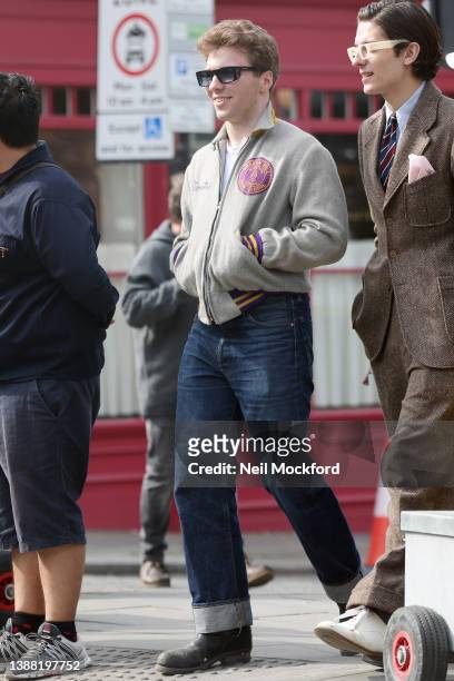 Rocco Ritchie seen walking down Portobello Road with a friend on March 28, 2022 in London, England.