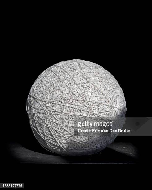 ball of white string - eric van den brulle stock pictures, royalty-free photos & images
