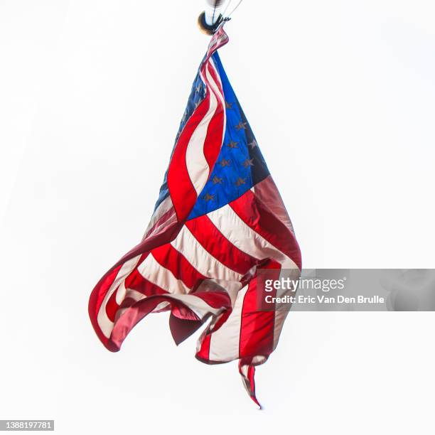 crumpled usa flag from low angle - eric van den brulle stock pictures, royalty-free photos & images