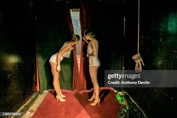 Two dancers look through the curtain during a rehearsal as Blackpool Tower Circus prepares to reopen following £1 Million renovation on March 28,...