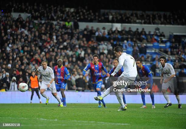 Cristiano Ronaldo of Real Madrid celebrates scores Real's opening goal from the penalty spot during the La Liga match between Real Madrid and Levante...