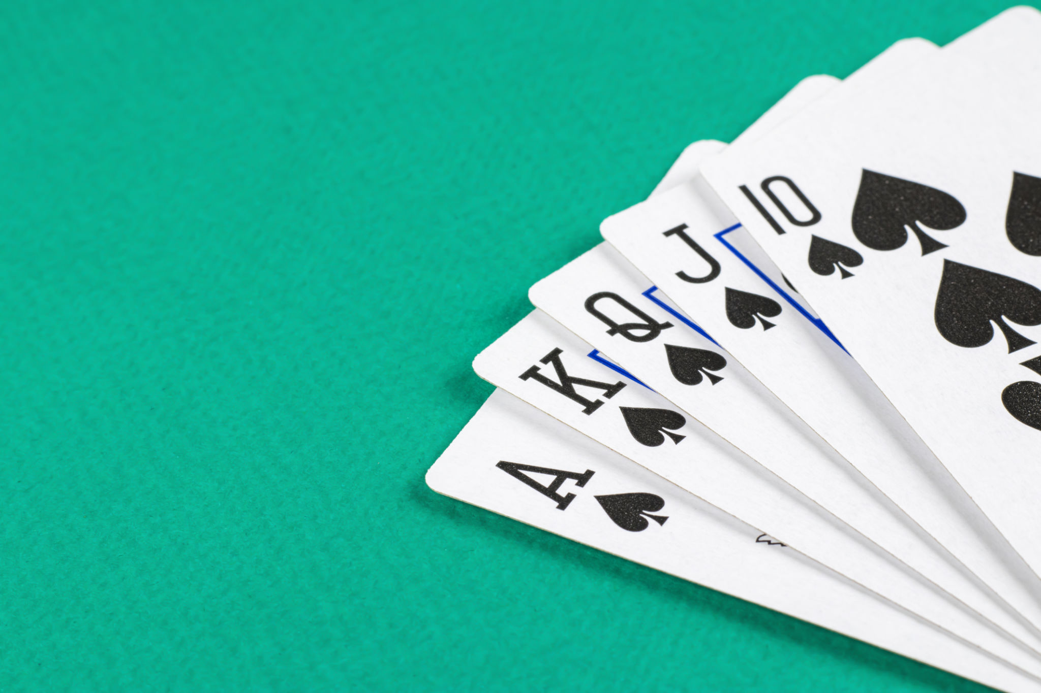 Playing cards on green background. Playing cards on green background.