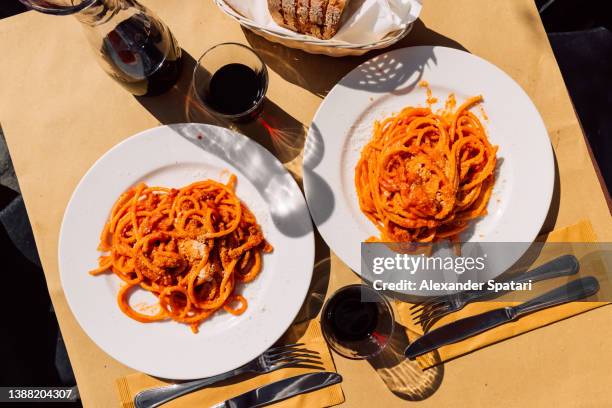 pasta amatriciana served in italian restaurant in rome, italy - pasta fotografías e imágenes de stock