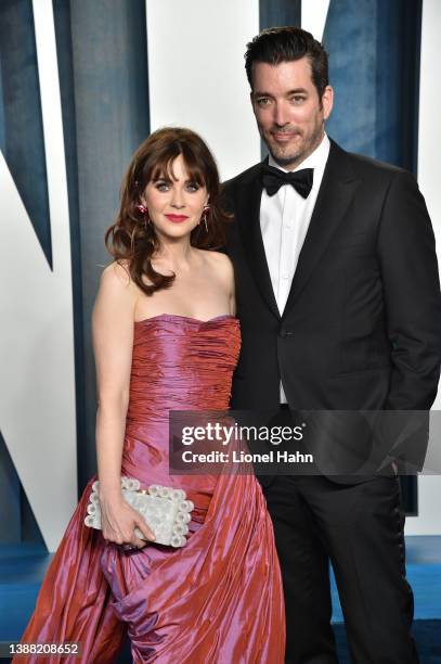 Zooey Deschanel and Jonathan Scott attend the 2022 Vanity Fair Oscar Party hosted by Radhika Jones at Wallis Annenberg Center for the Performing Arts...
