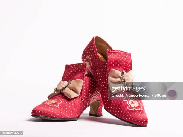 fallas shoes,close-up of red shoes over white background,valencia,spain - paio foto e immagini stock