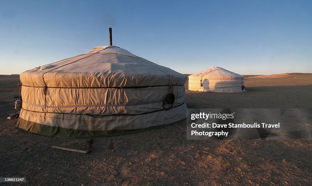 Nomadic gers at sunrise in Gobi Desert