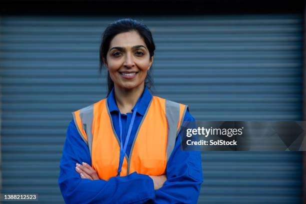 female project manger - reflective clothing stock pictures, royalty-free photos & images