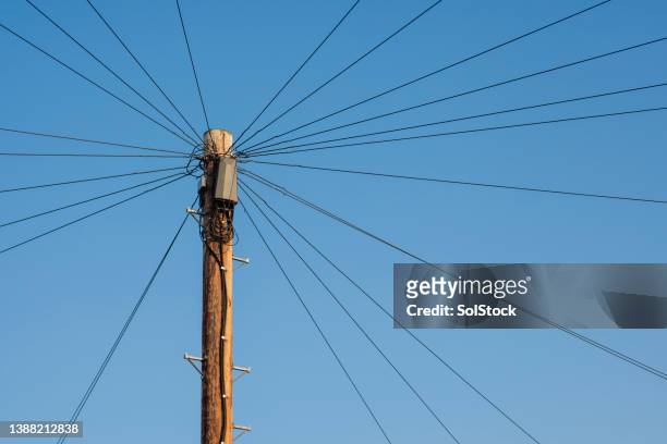 telephone pole in the uk - utility pole stock pictures, royalty-free photos & images