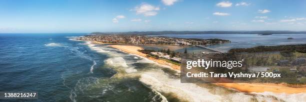 between waters,aerial view of sea against sky,the entrance,new south wales,australia - tuggerah lake stock pictures, royalty-free photos & images