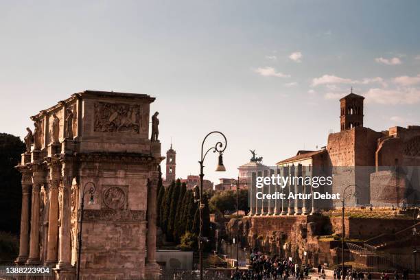 dramatic view of the ancient rome with temples and ruins. - ancient rome stock-fotos und bilder