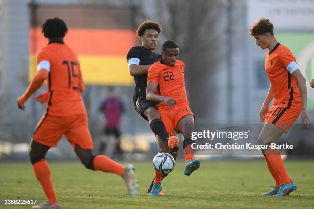 Nnamdi Collins of Germany challenges Bayron Strijdonck of Netherlands during the international friendly match between Germany U18 and Netherlands U18...