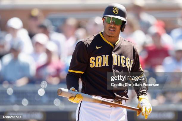 Manny Machado of the San Diego Padres bats against the Los Angeles Angels during the MLB spring training game at Peoria Stadium on March 23, 2022 in...