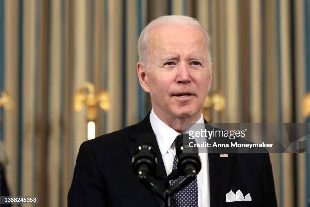 President Joe Biden answers questions after introducing his budget request for fiscal year 2023 in the State Dining Room of the White House on March...