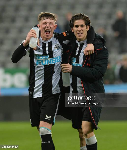 Newcastle United's Jay Turner-Cooke and Santiago Munoz celebrate to the camera after Newcastle win the Premier League 2 match between Newcastle...