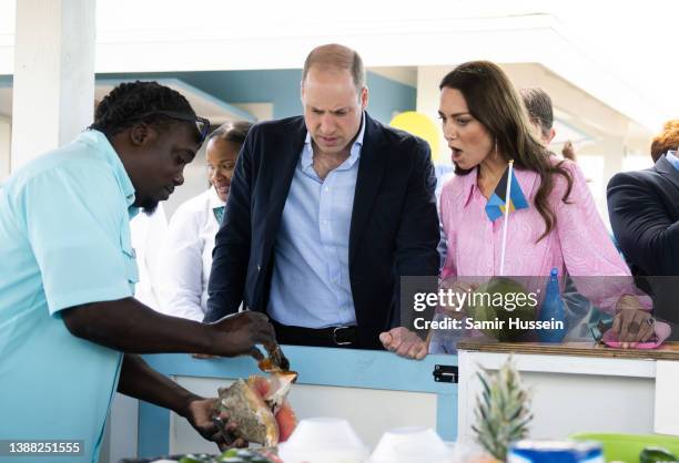 Prince William, Duke of Cambridge and Catherine, Duchess of Cambridge have a conch prepared for them during a visit to Abaco on March 26, 2022 in...