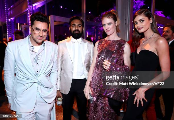 Dan Levy, Himesh Patel, Mackenzie Davis and Taylor Hill attend the 2022 Vanity Fair Oscar Party hosted by Radhika Jones at Wallis Annenberg Center...